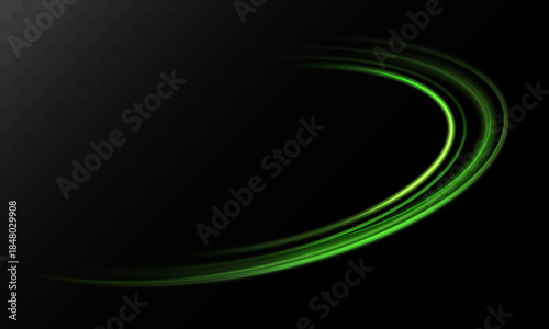 Green neon light trail with smooth curved motion lines creating abstract dynamic energy effect on dark background.
