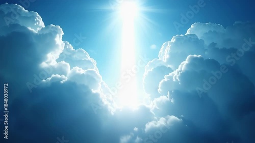 Bright divine light rays bursting through parted white clouds in deep blue sky, heavenly sunlight beam illuminating heavens, concept of christianity, hope, spiritual awakening