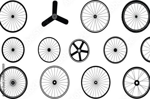 Assortment of Bicycle Wheels and a Fan Blade Silhouette on White Keywords: bicycle wheel, bike wheel, tire, rim, spokes, hub, fan