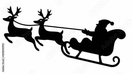 Santa Claus riding in his sleigh pulled by reindeer