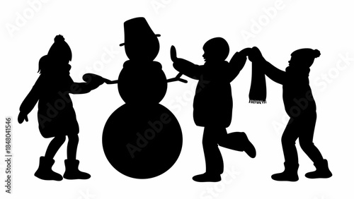 Children building a snowman together in winter fun