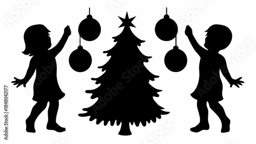 Two children decorating Christmas tree with ornaments in joyful silhouette