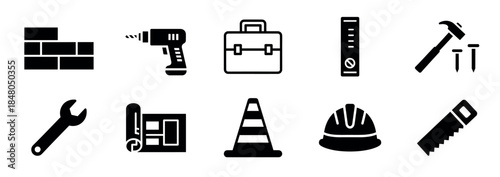 Set of black construction tool icons including a drill, hammer, saw, and hard hat in a minimalist glyph style for building and repair themes