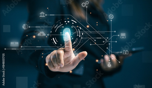 A professional authenticates with a digital fingerprint interface, representing cybersecurity, secure access, identity verification, data protection, and advanced business security systems.
