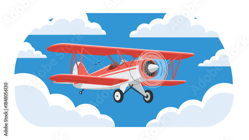 Vintage biplane soars through a bright blue sky surrounded by fluffy white clouds, evoking a sense of adventure and classic aviation.