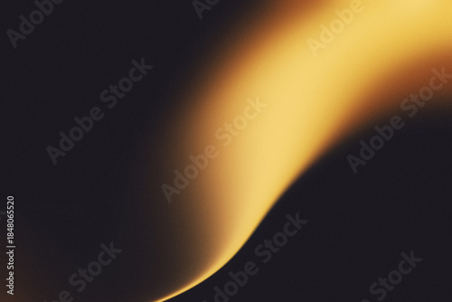 Golden amber and warm glow grainy gradient blur background. Cinematic luxury abstract background.