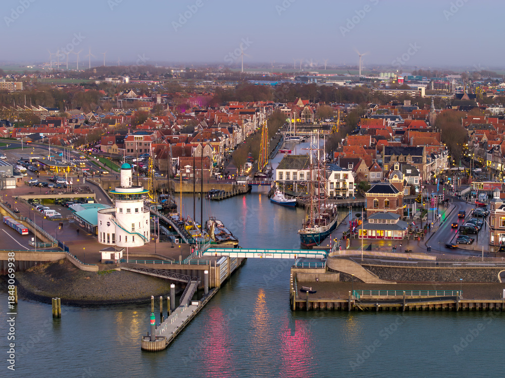 Obraz premium Aerial drone view of Harlingen ferry terminal at dusk