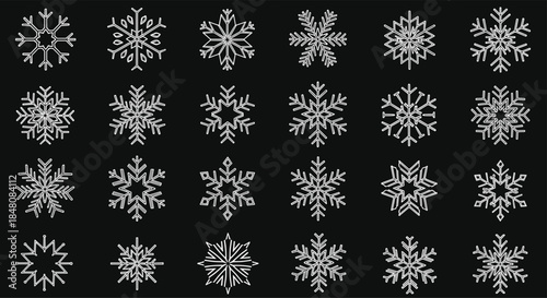 A large collection of intricate white snowflake icons with various geometric shapes on a solid black winter background.