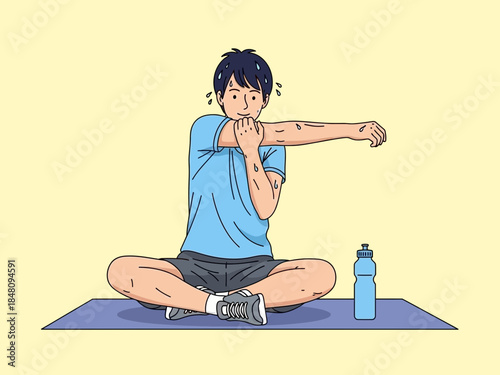 Young man doing a shoulder stretch while sitting on a yoga mat, ready for a workout with a water bottle nearby