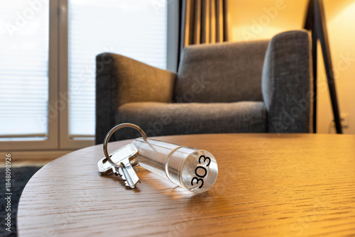 hotel or apartment key on table