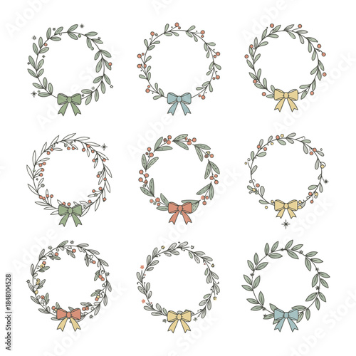 Set of nine hand drawn christmas wreaths with bows and berries on white background