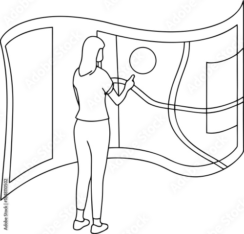 Young woman standing and pointing at a large interactive digital map for travel planning and exploration