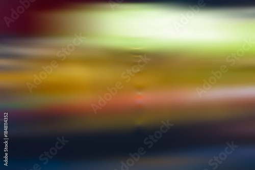 Abstract horizontal motion blur texture. Yellow, grey and brown speed lines background resembling a moving landscape or fast travel.