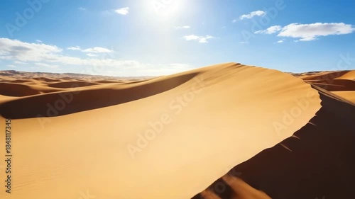 Golden Sand Dunes Under Bright Sunlight
