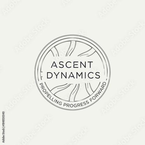 Ascent Dynamics logo with sunburst and text.