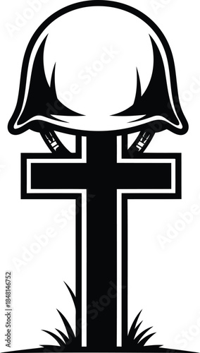 Black and white military helmet resting on a cross with grass