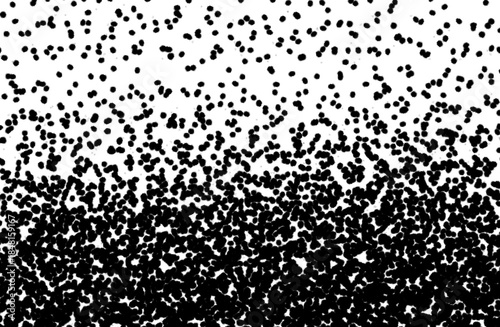 Black and white grunge gradient dot texture overlay. Abstract noise pattern for distress and scratch effects.