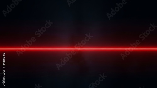 Intense glowing red horizontal laser line cuts across a dark mysterious background creating a futuristic energy effect