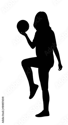 Young woman holding a soccer ball, wearing athletic uniform.