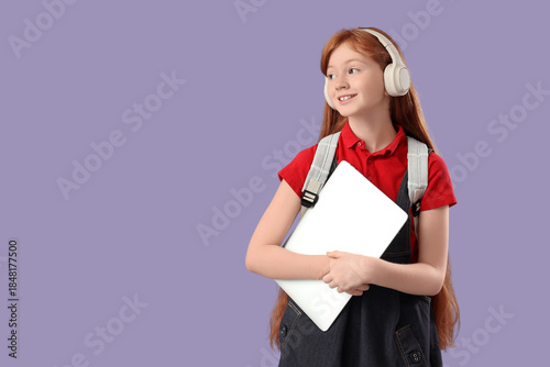 Cute schoolgirl with modern...