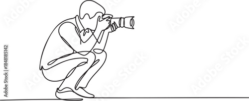 Continuous line drawing of a male photographer crouching down and holding camera