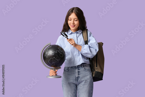 Young Asian woman with glob...