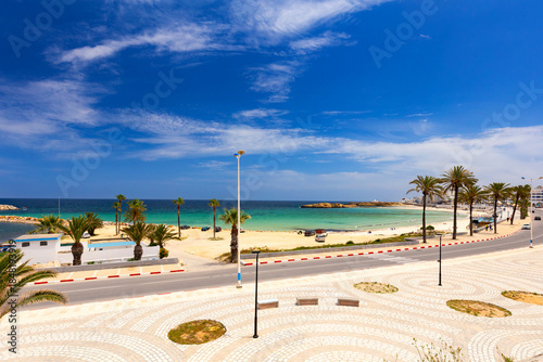 Obraz na plátne Coastal road with palm trees, beach and turquoise water in Monastir, northeaster