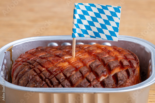 baked bavarian leberkaese on light wood