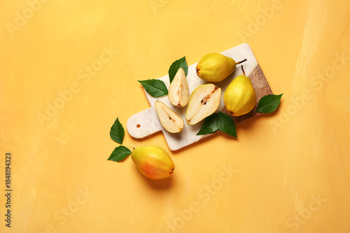Board with fresh pears and ...