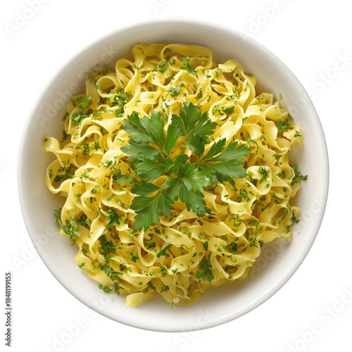 Fresh Pasta Served in a White Bowl With Green Herbs on Top at a Kitchen Table