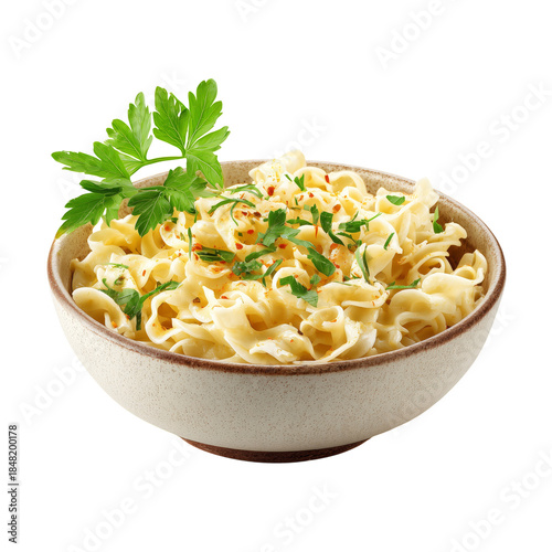Fresh Pasta Served in a White Bowl With Green Herbs on Top at a Kitchen Table