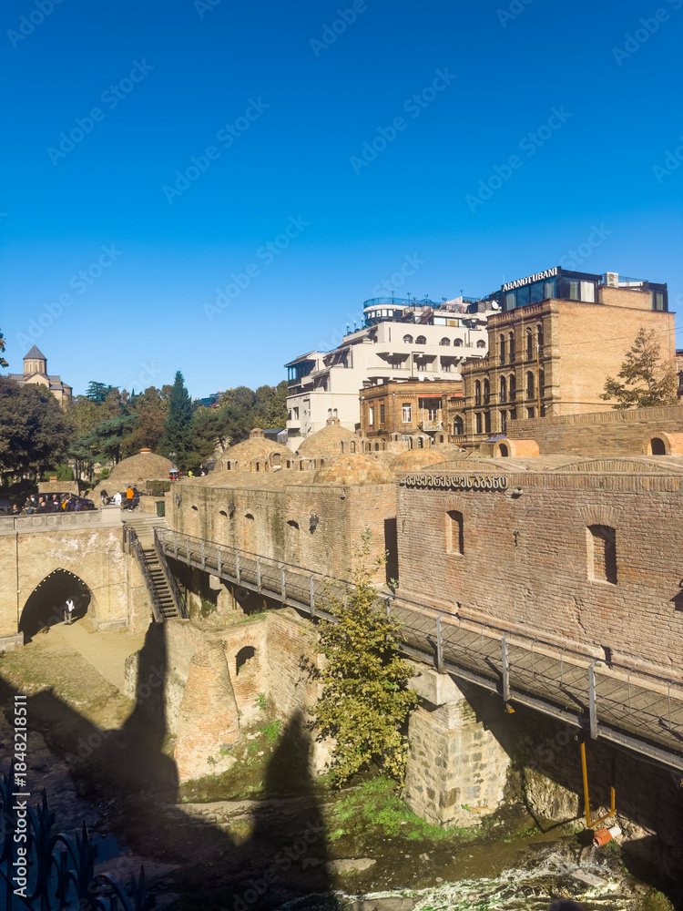 Fototapeta premium Historic Abanotubani Sulfur Baths and Brick Domes in Tbilisi Georgia