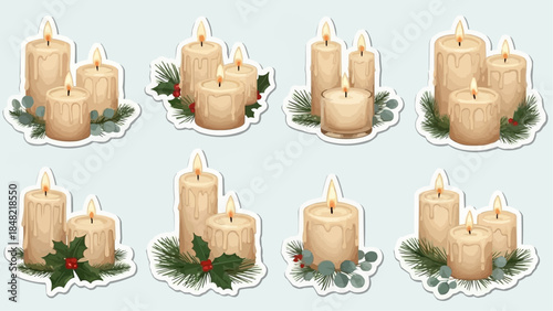 Festive holiday candles with evergreen and holly decorations