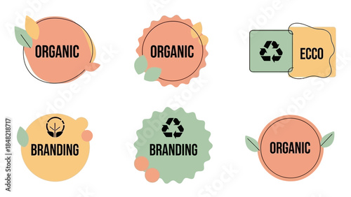 Set of six organic and eco-friendly branding labels with leaves and recycling symbols on a bright studio background.