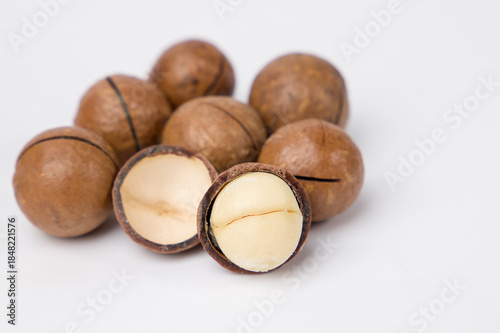 Macadamia nuts on a white background. Close-up.