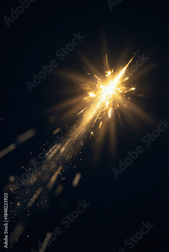 Radiant Golden Shooting Star with Sparkling Trails in a Dark Night Sky