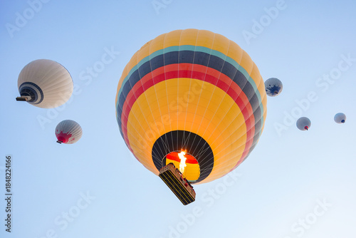 Hot Air Balloon over Cappadocia Valleys in Nevsehir, Turkiye