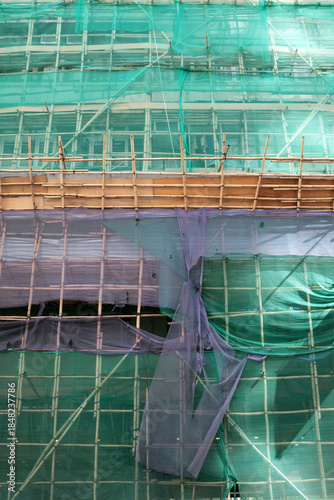 Photos A Building in Hong Kong with traditional bamboo scaffolding.