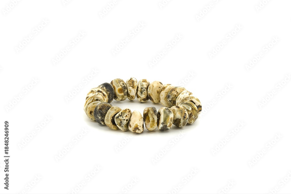 Obraz premium Natural Baltic chalk amber bracelet photographed in studio on white background