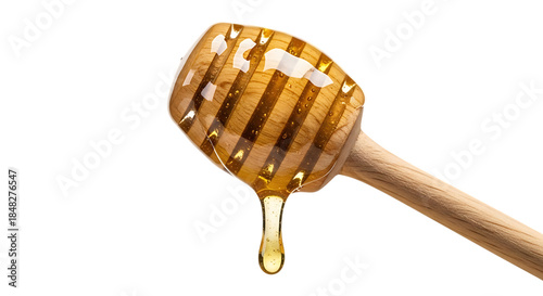 Wooden honey dipper, with dripping golden honey, isolated on a transparent background, cutout, PNG
