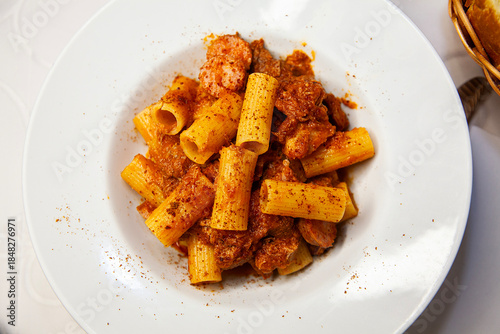 Italian food rigatoni pomodoro close up overview