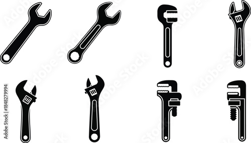 Assortment of black and white wrench tools displayed in a grid arrangement