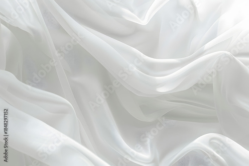 Delicate White Fabric: The image features a close-up of a delicate white fabric with soft folds. It conveys a sense of elegance and sophistication.