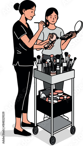 Makeup Artist Applying Cosmetics To A Client Using A Cart Full Of Brushes