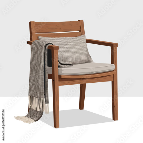 Elegant wooden armchair with cushion and cozy throw blanket showcasing modern interior design