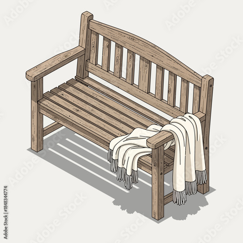 Wooden garden bench with a blanket draped over it perfect for outdoor relaxation