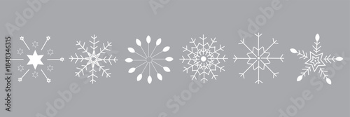 Set of cute symmetric blue snowflakes isolated on a transparent background. Cartoon decorative elements. Editable stroke. Ideal for Christmas, New Year, and winter designs