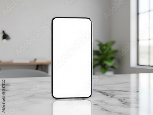 Smartphone with blank screen on a marble desk in a modern office or home workspace