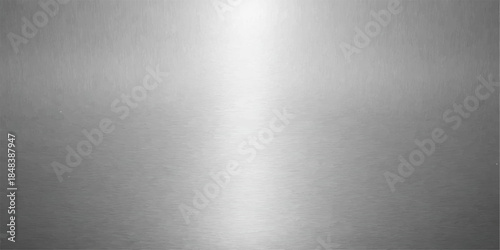 Brushed metal background texture features a polished stainless steel plate pattern with a shiny silver metallic surface and light reflections on an industrial gray aluminum backdrop material
