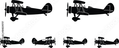 Vintage biplane airplane silhouettes set, classic propeller aircraft side views, retro aviation transport icons, isolated black vector illustration for travel, history design